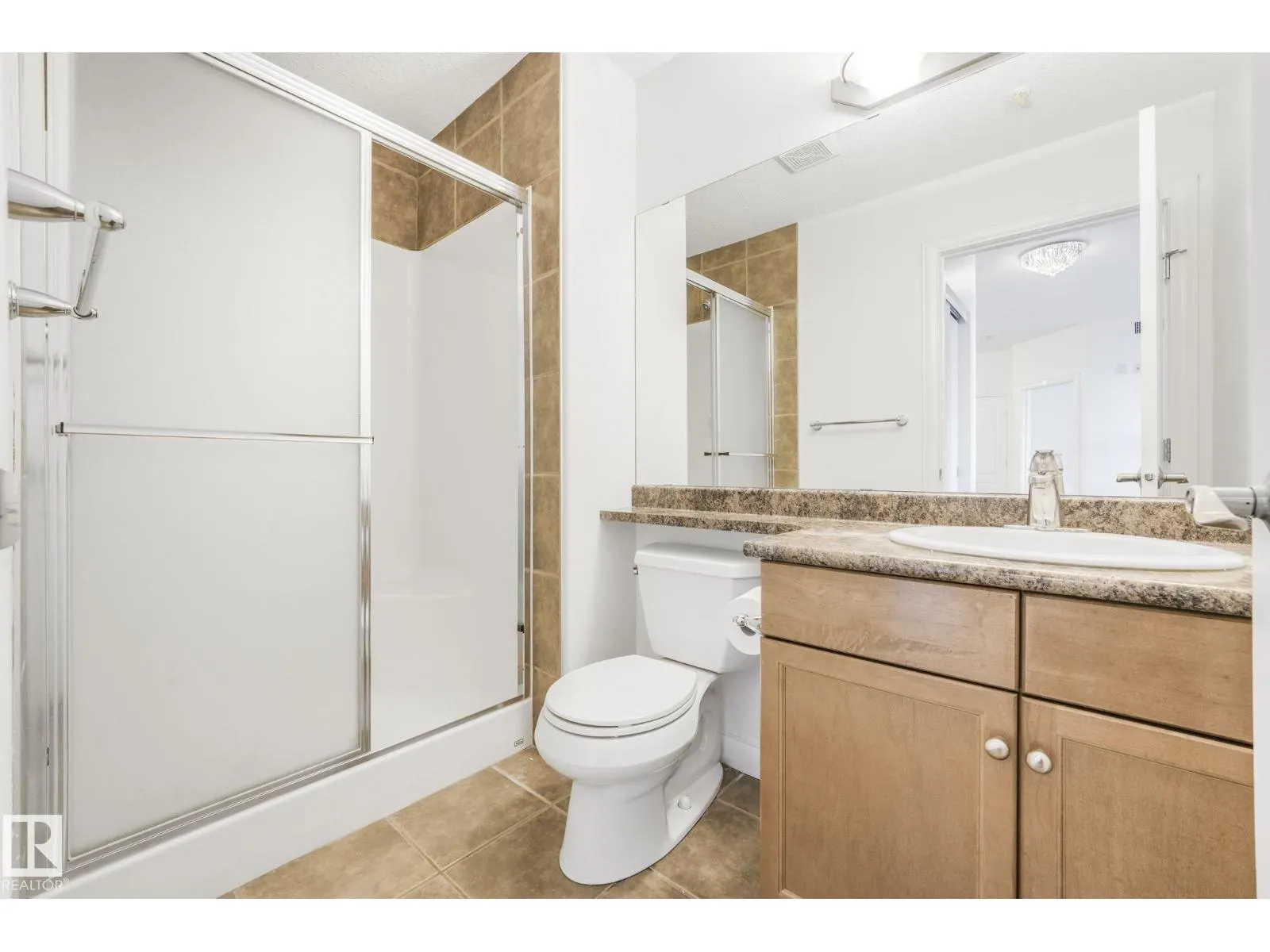 #232 1406 HODGSON WY NW