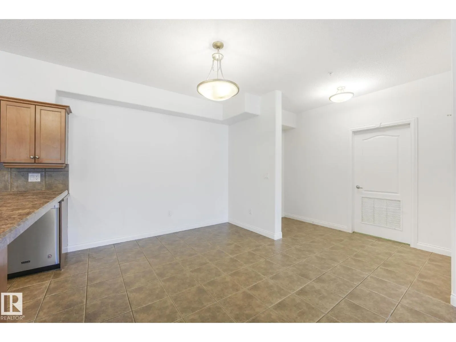 #232 1406 HODGSON WY NW