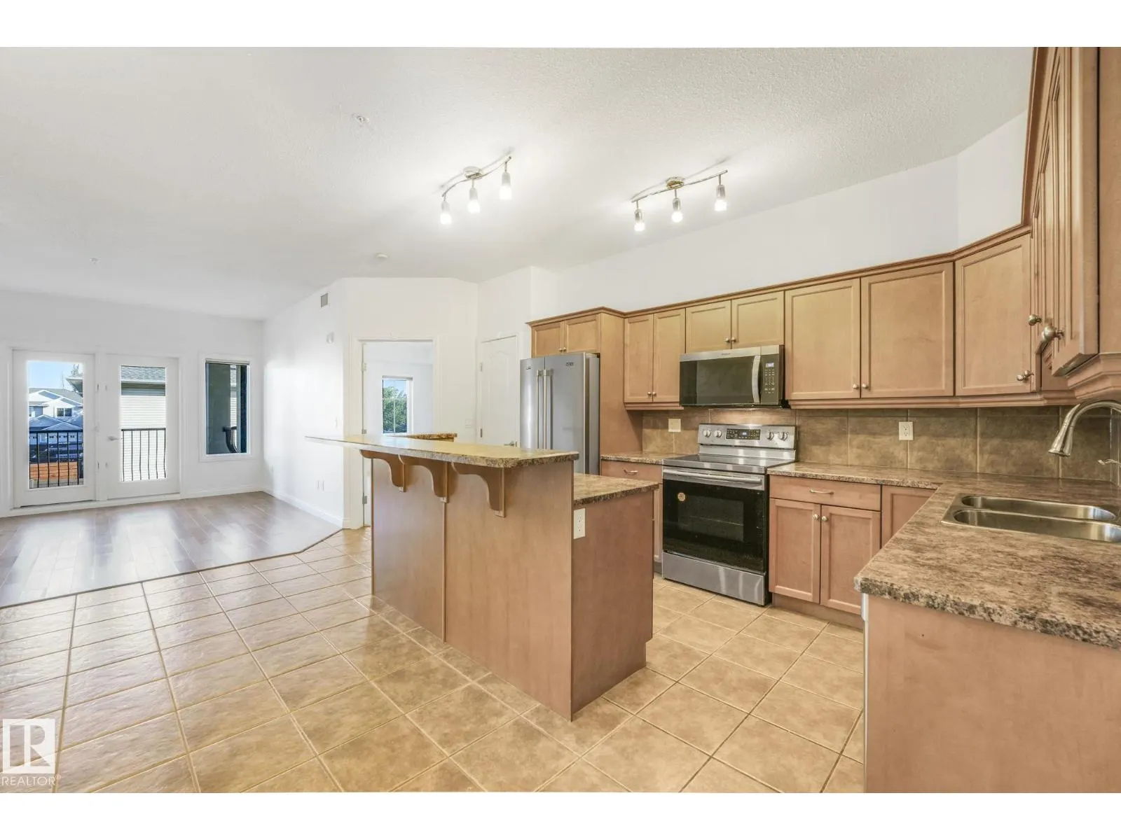 #232 1406 HODGSON WY NW