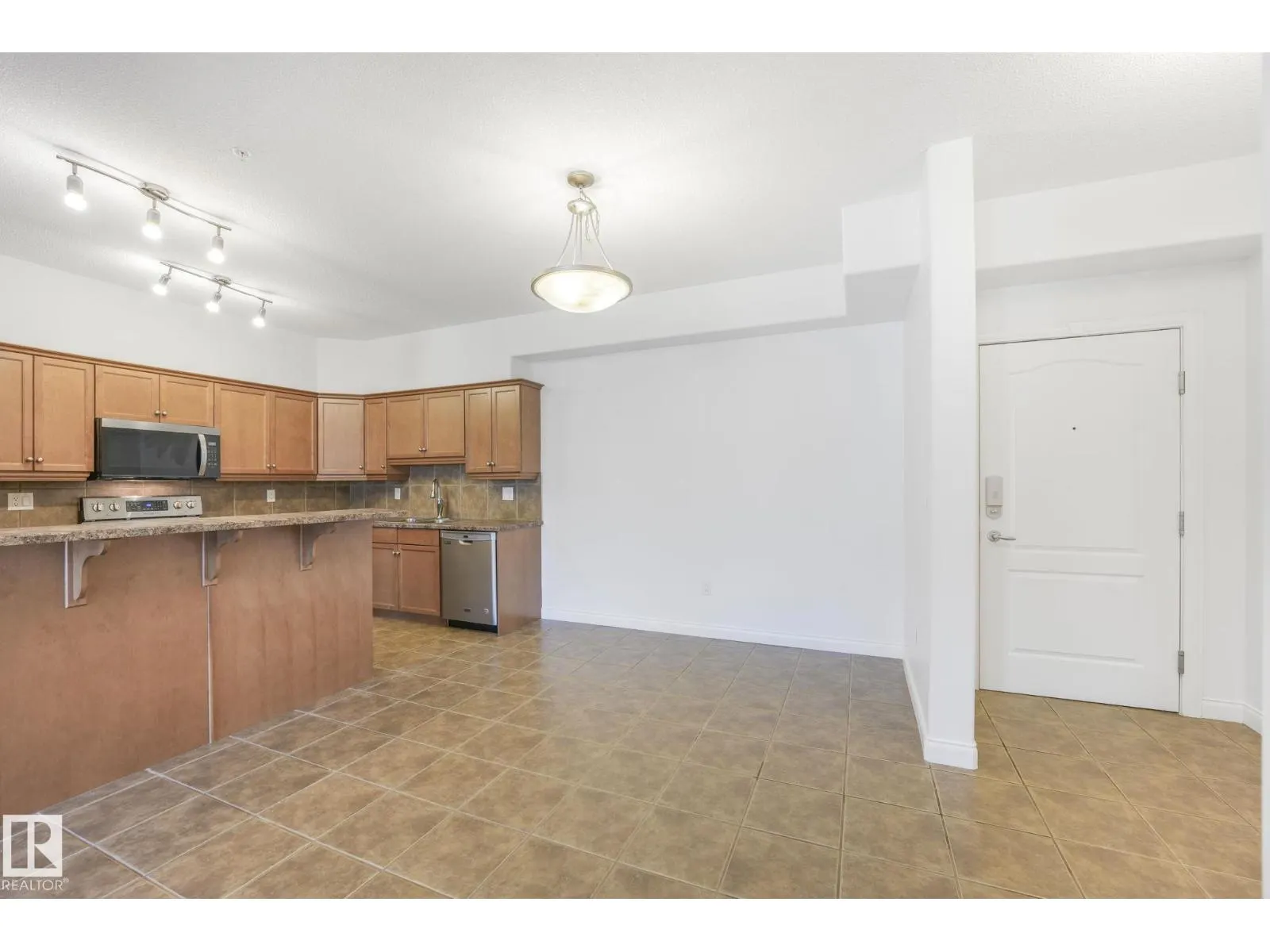 #232 1406 HODGSON WY NW