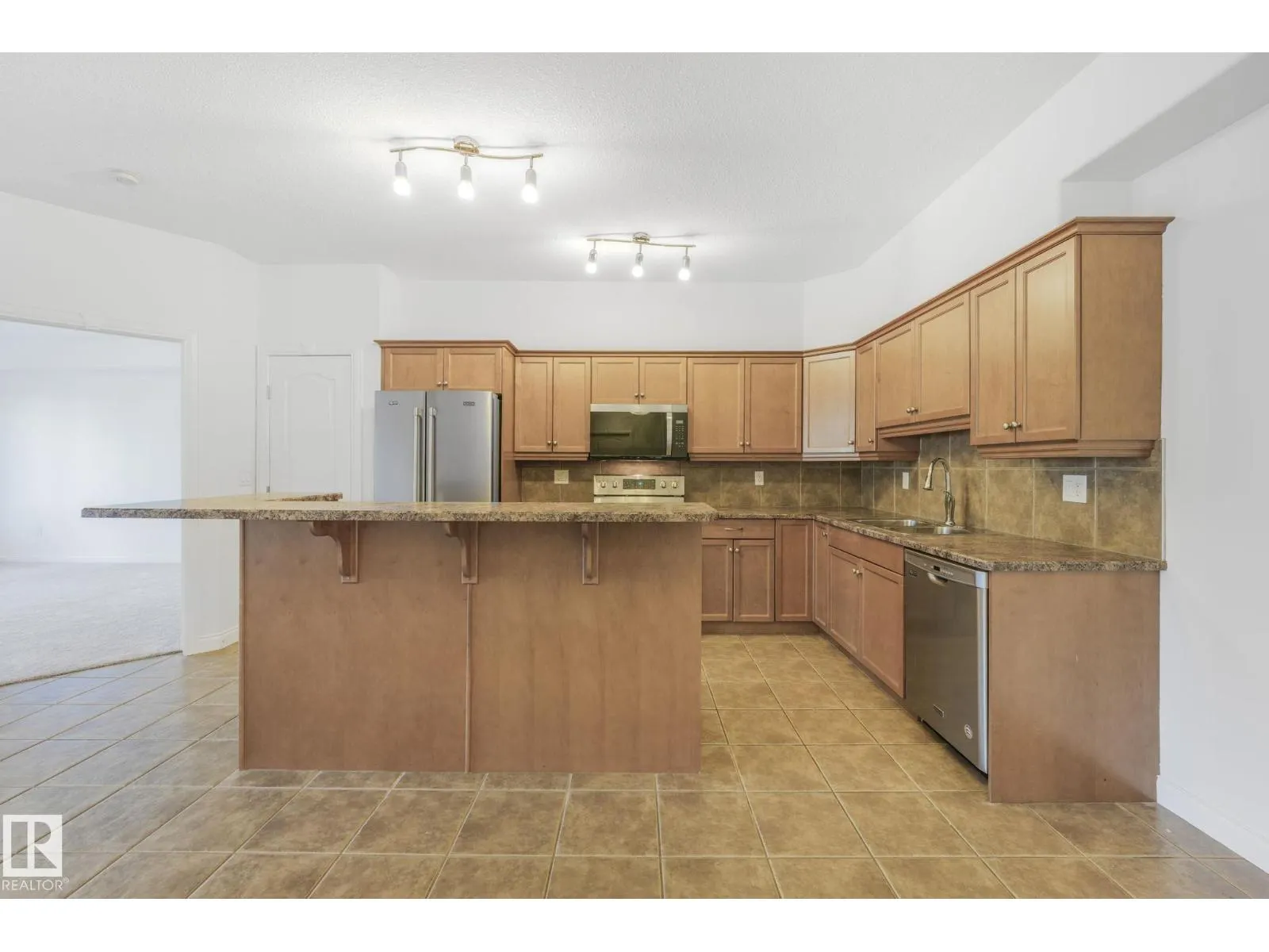 #232 1406 HODGSON WY NW