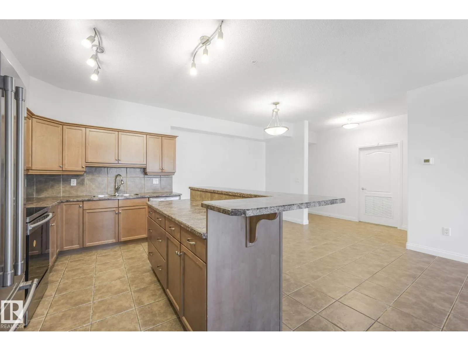 #232 1406 HODGSON WY NW