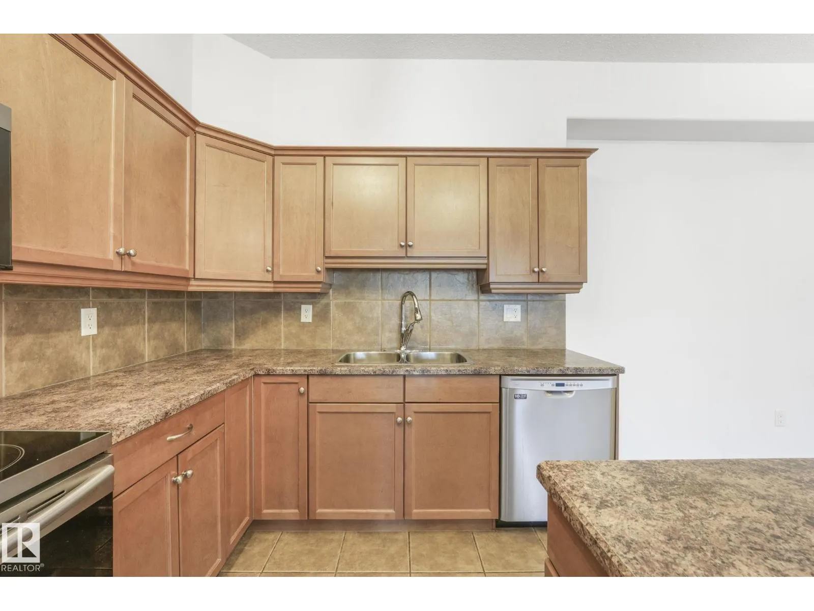 #232 1406 HODGSON WY NW