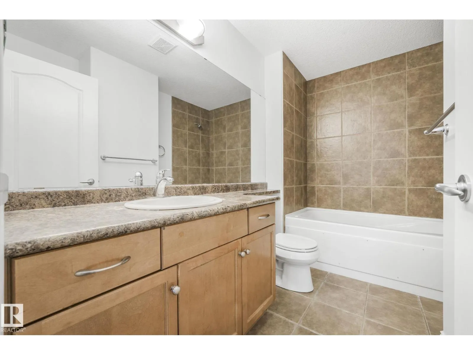 #232 1406 HODGSON WY NW