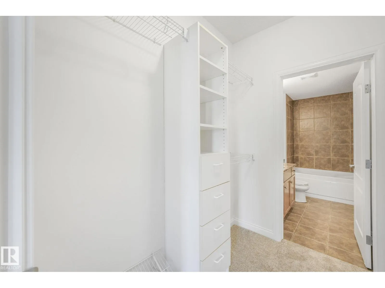 #232 1406 HODGSON WY NW