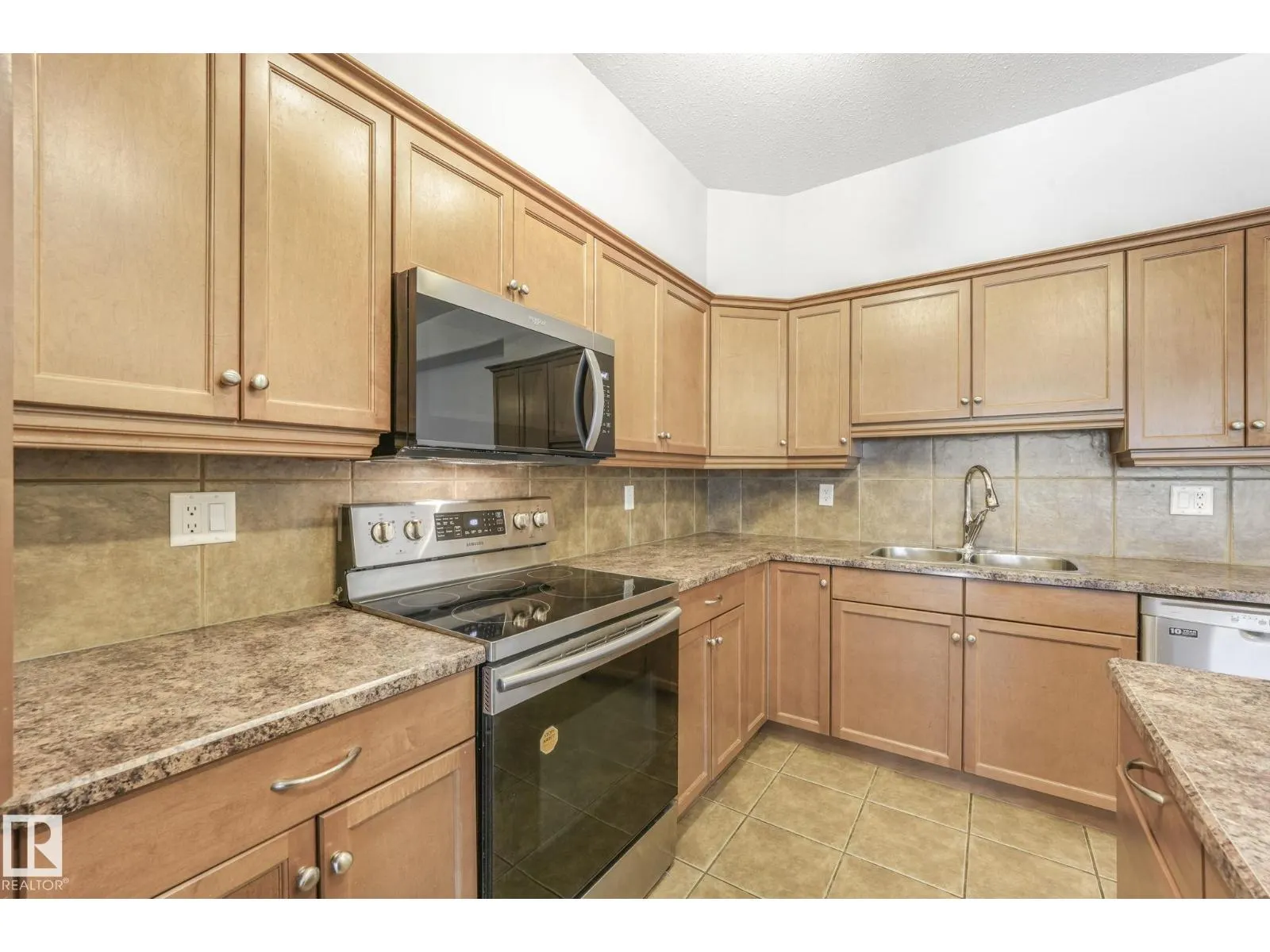 #232 1406 HODGSON WY NW