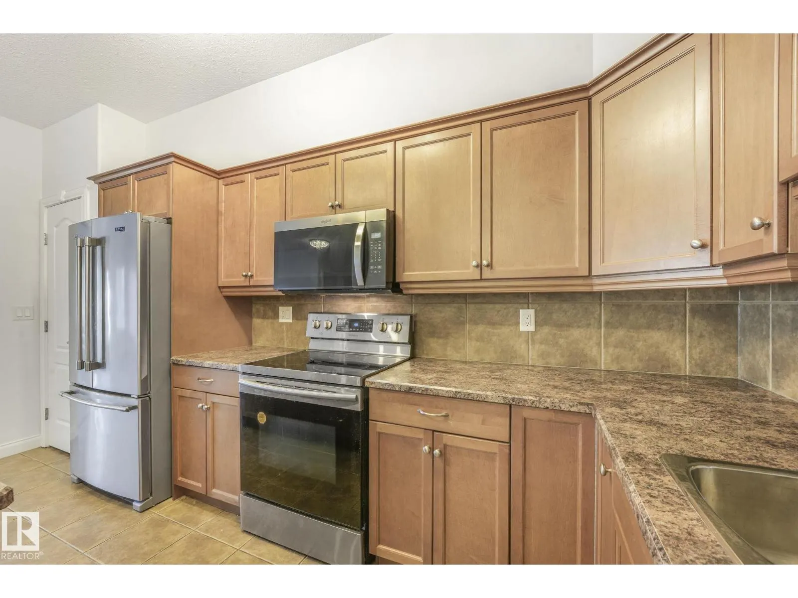#232 1406 HODGSON WY NW