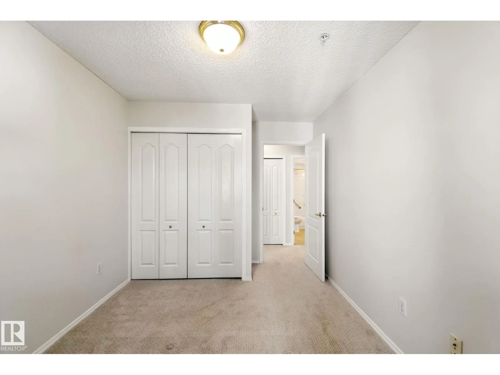 #205 13450 114 AV NW