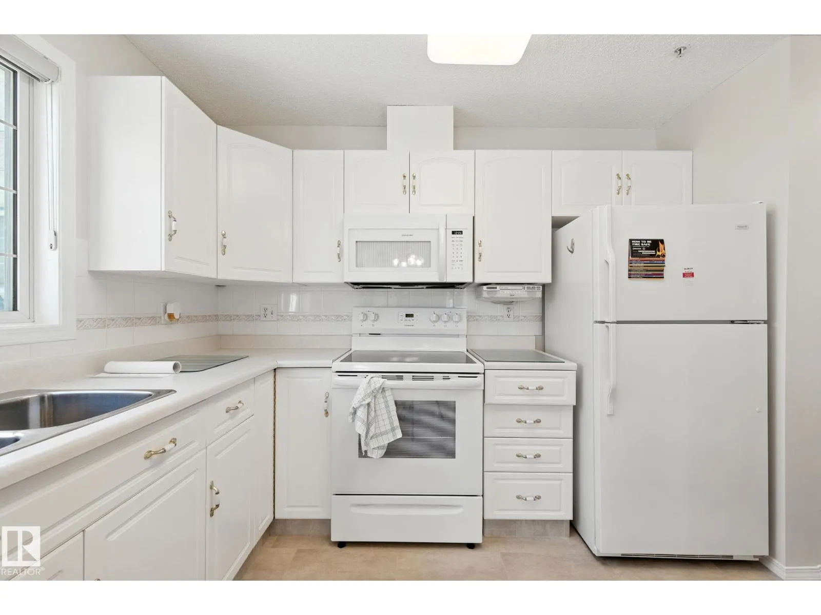 #205 13450 114 AV NW