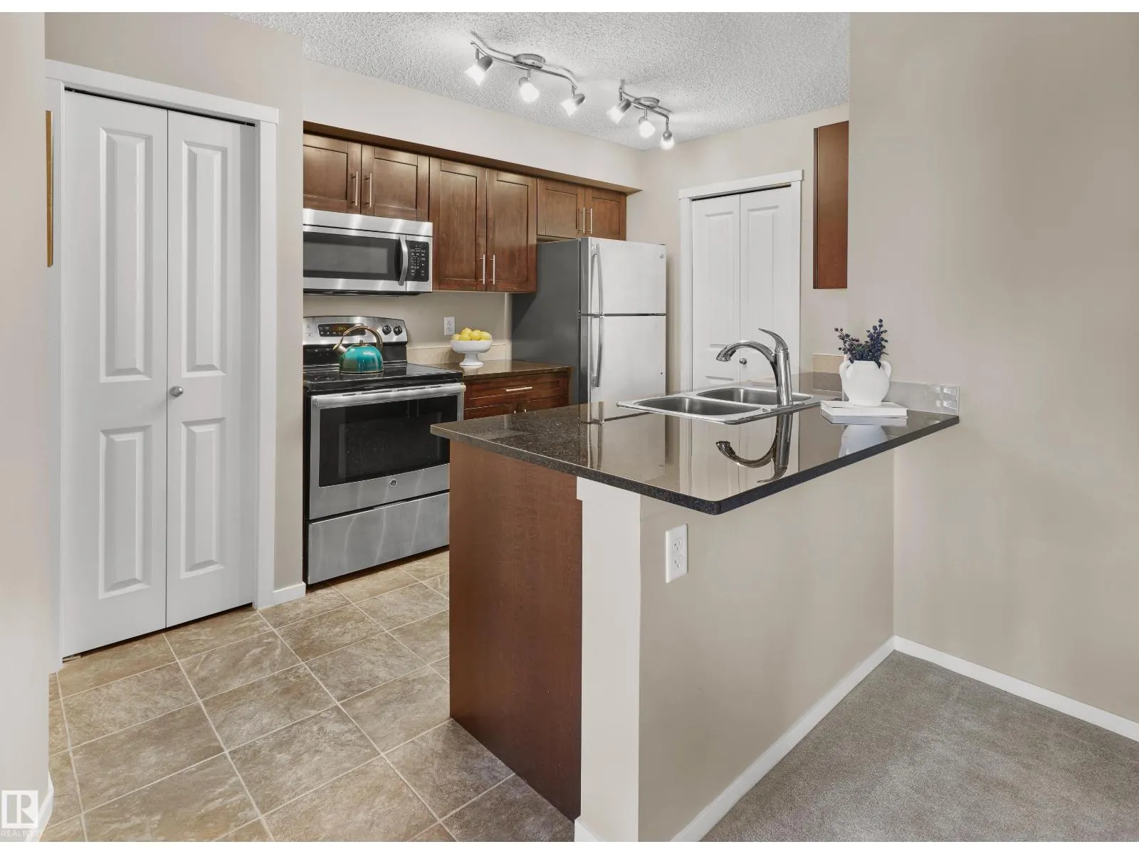 #407 5816 MULLEN PL NW