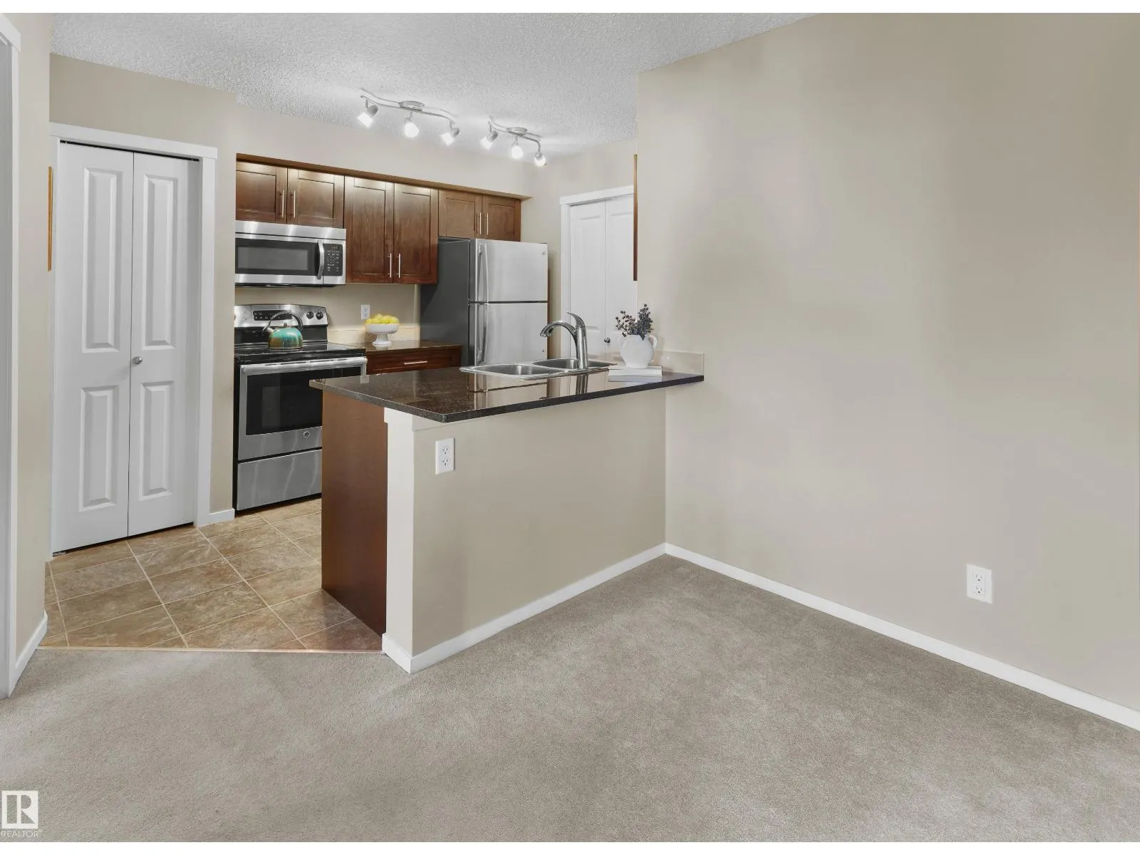 #407 5816 MULLEN PL NW