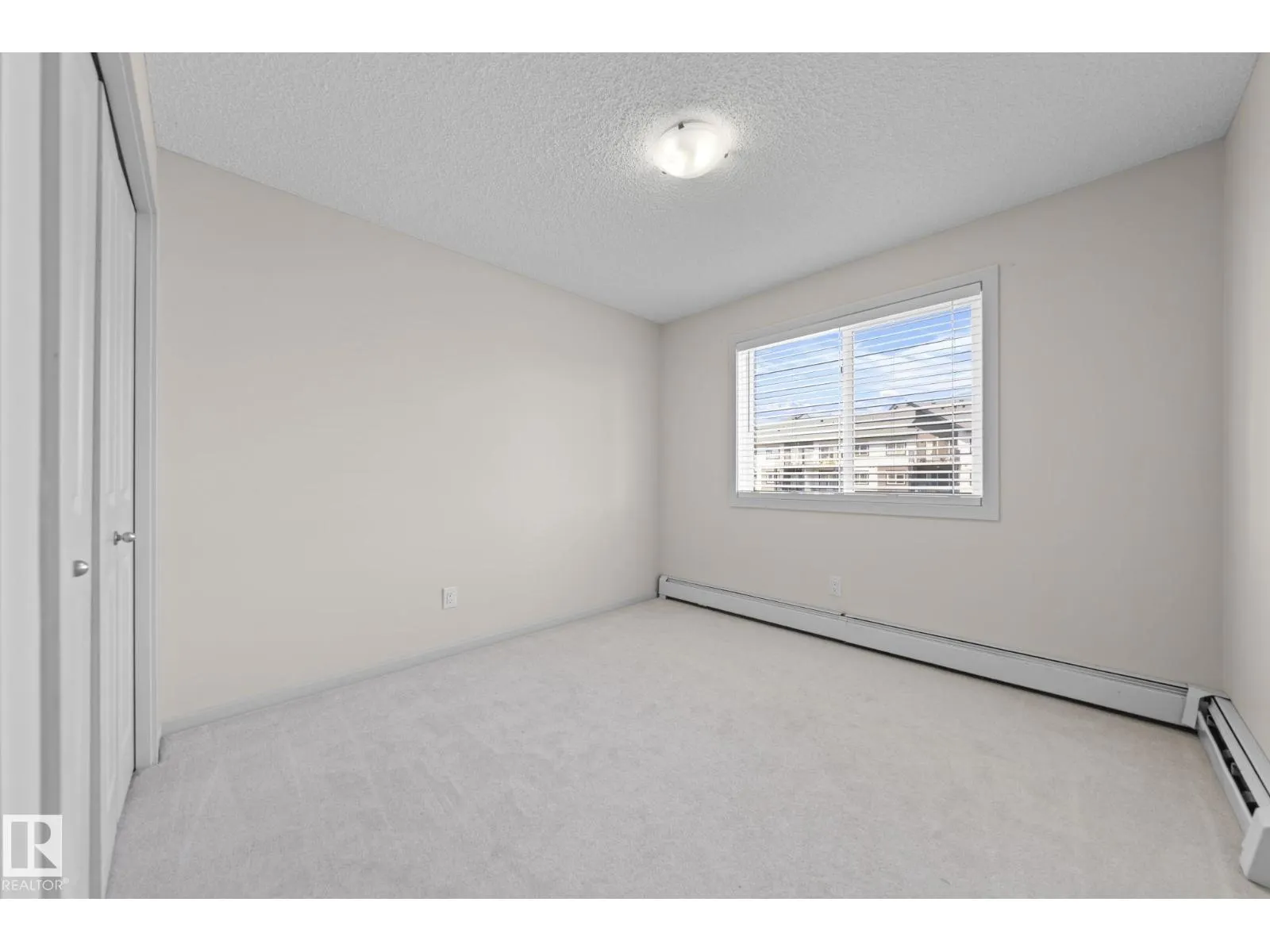 #306 3353 16A AV NW