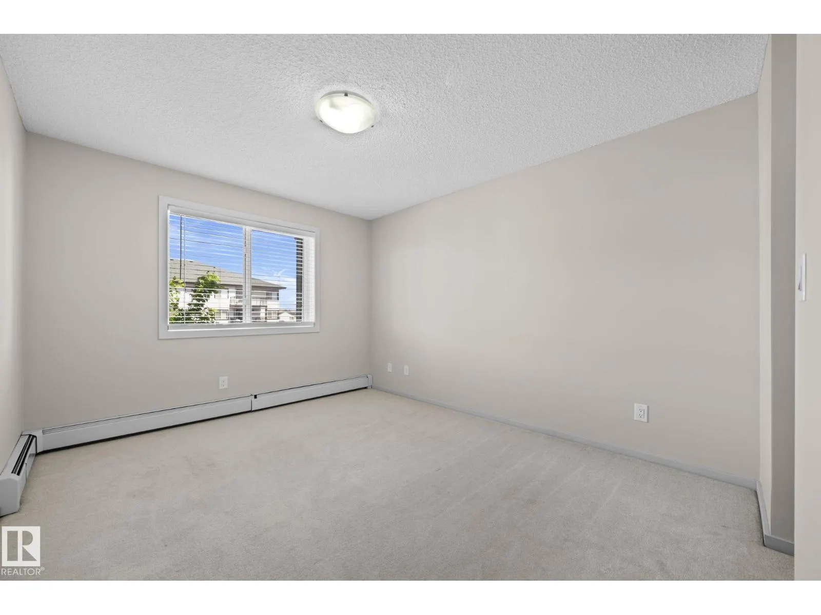 #306 3353 16A AV NW
