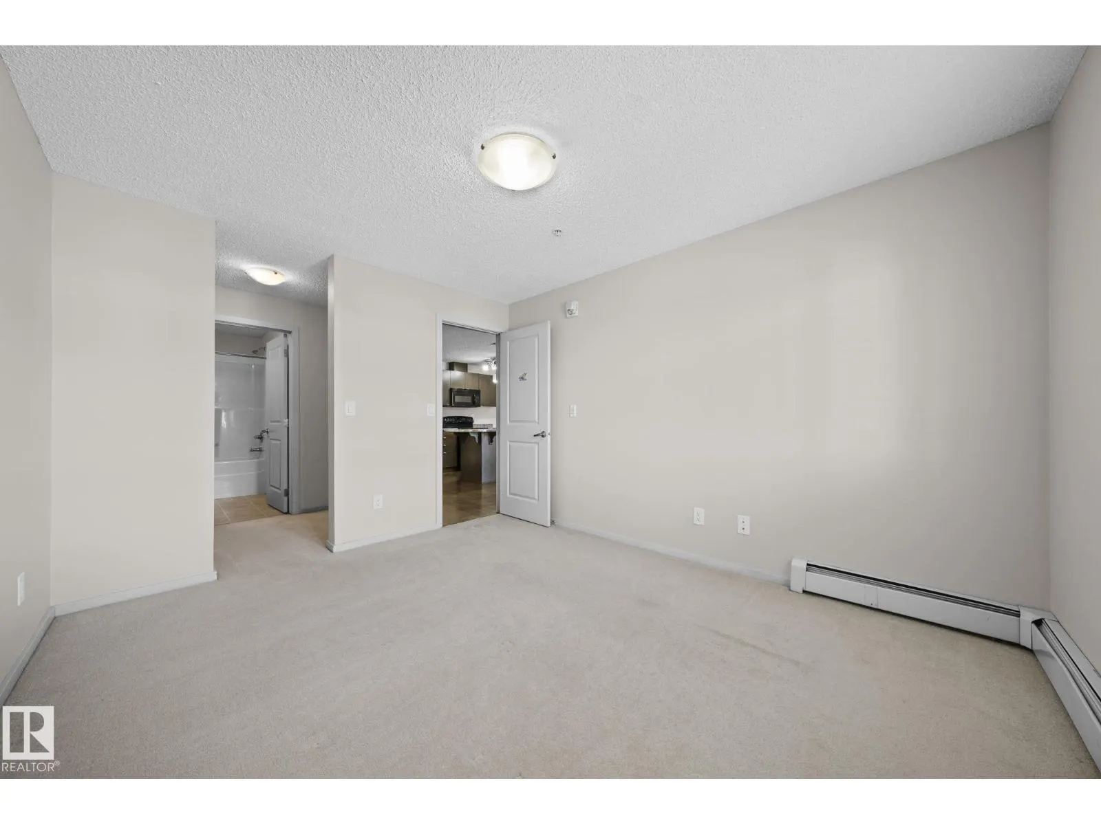 #306 3353 16A AV NW