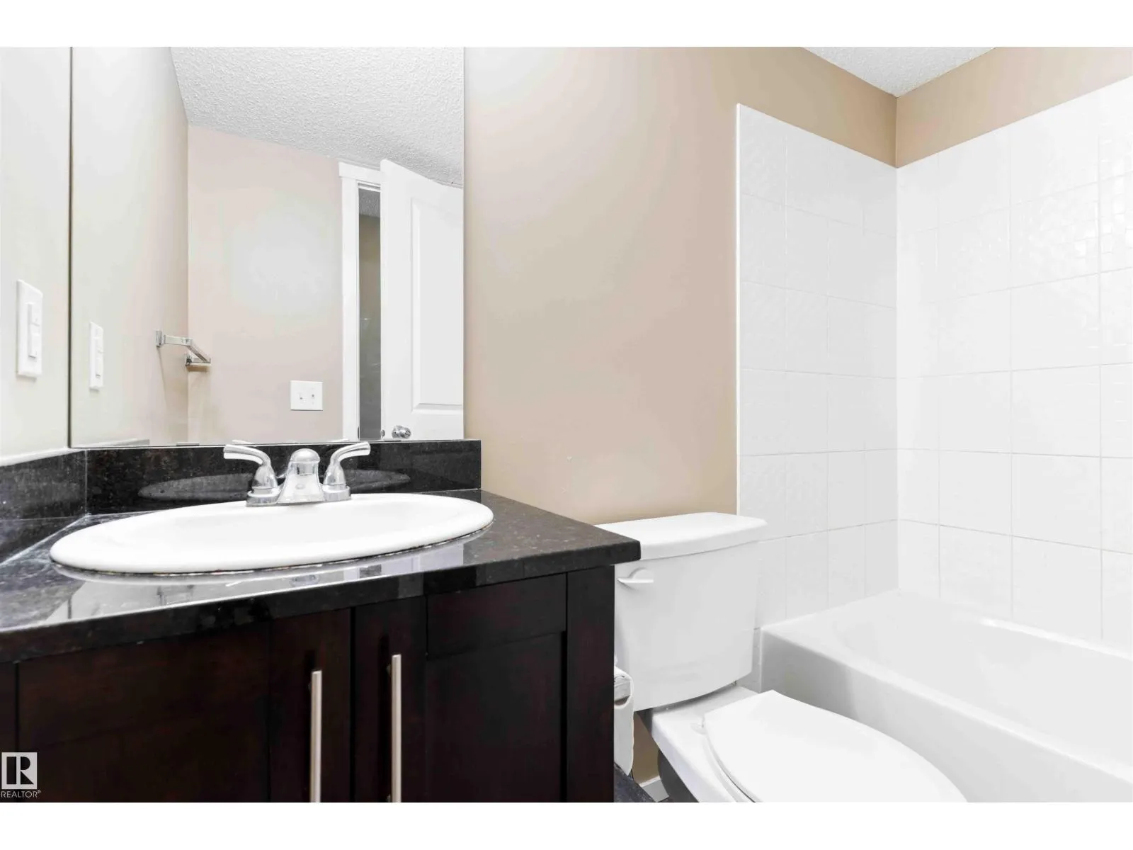 #410 18126 77 ST NW