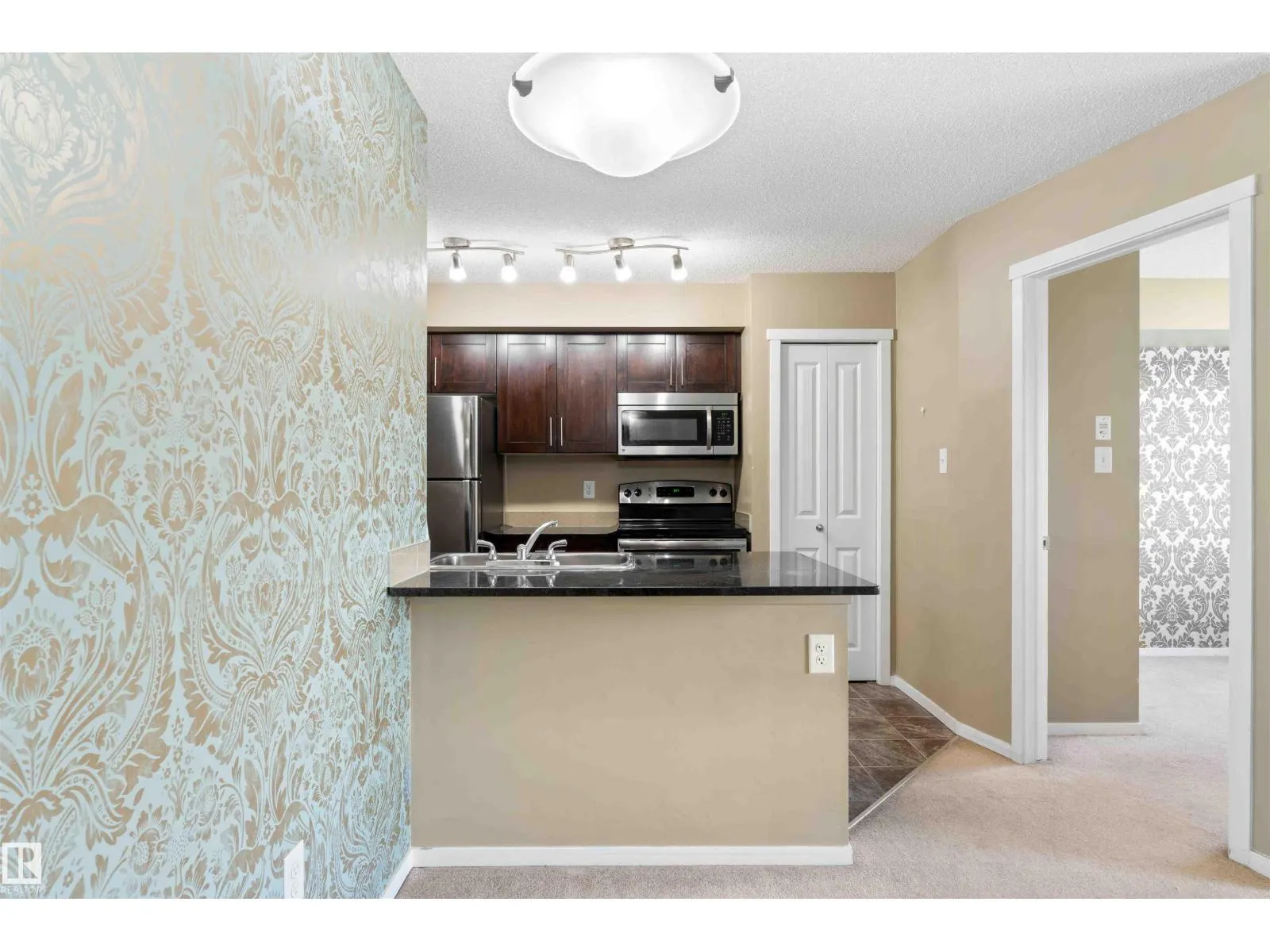 #410 18126 77 ST NW