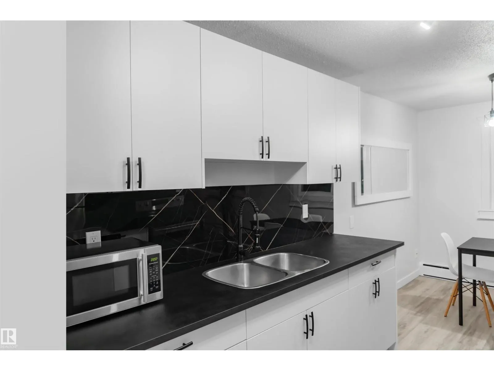 #107 7204 81 AV NW