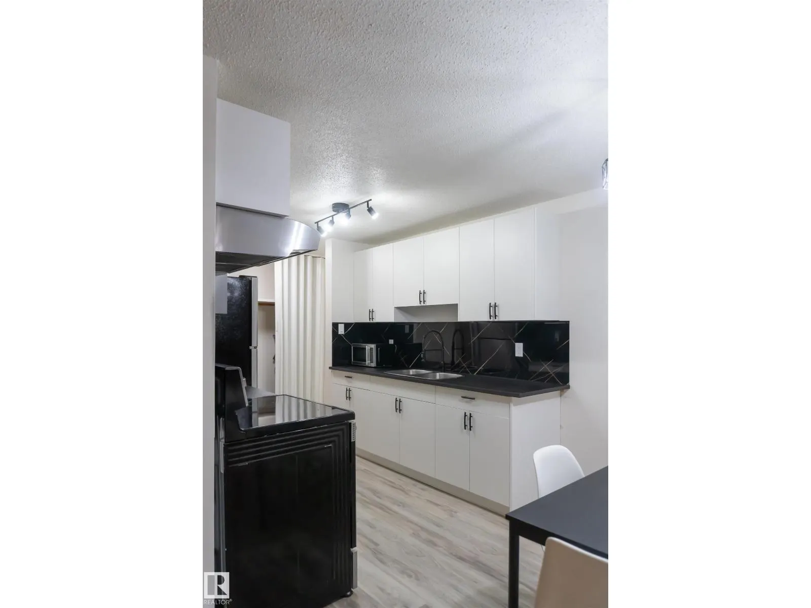 #107 7204 81 AV NW