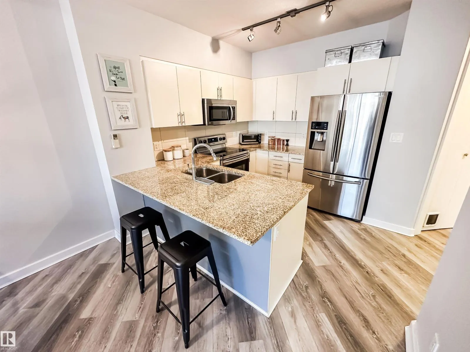 #703 10152 104 ST NW