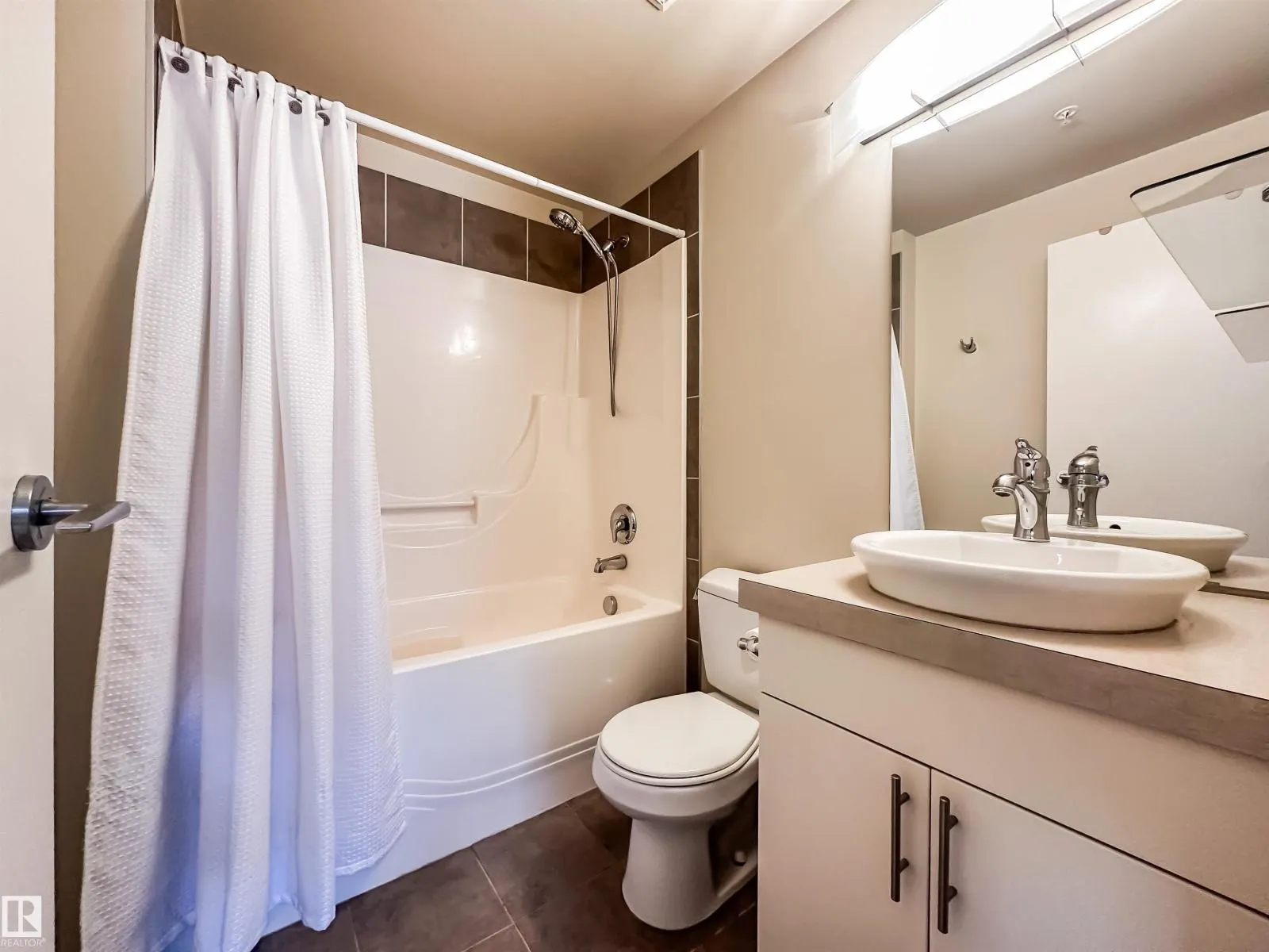 #703 10152 104 ST NW