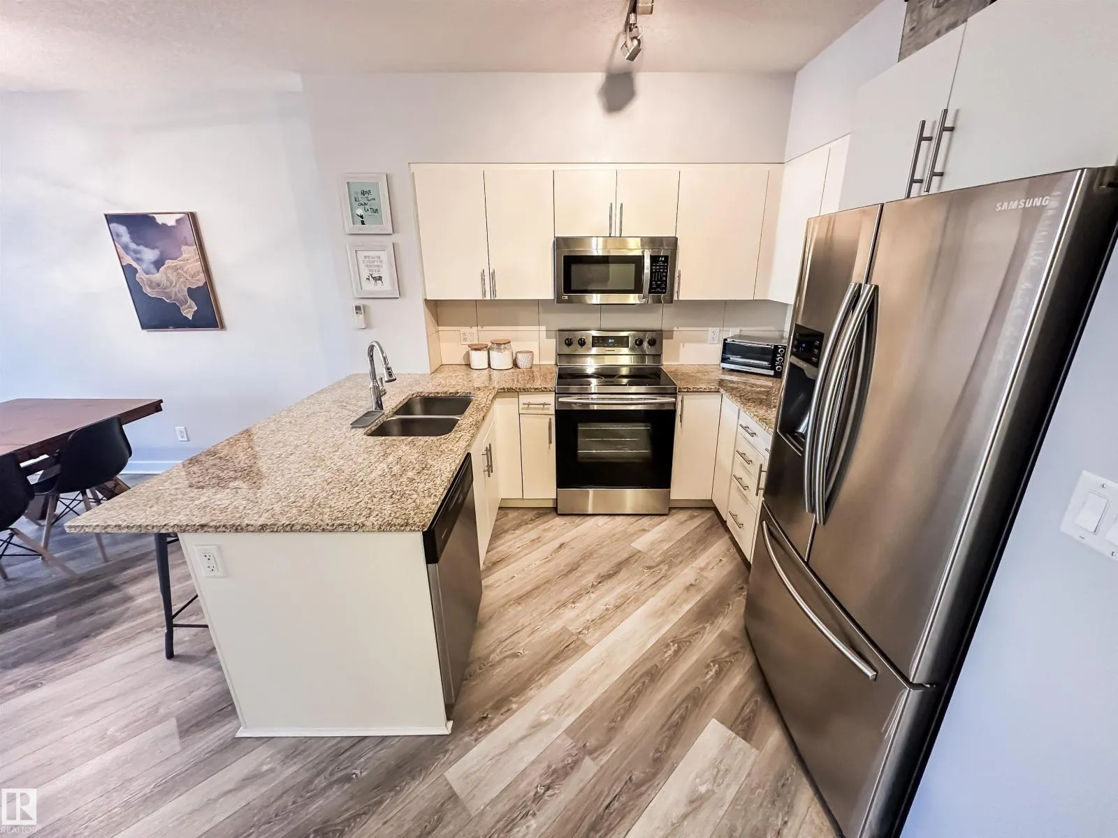 #703 10152 104 ST NW