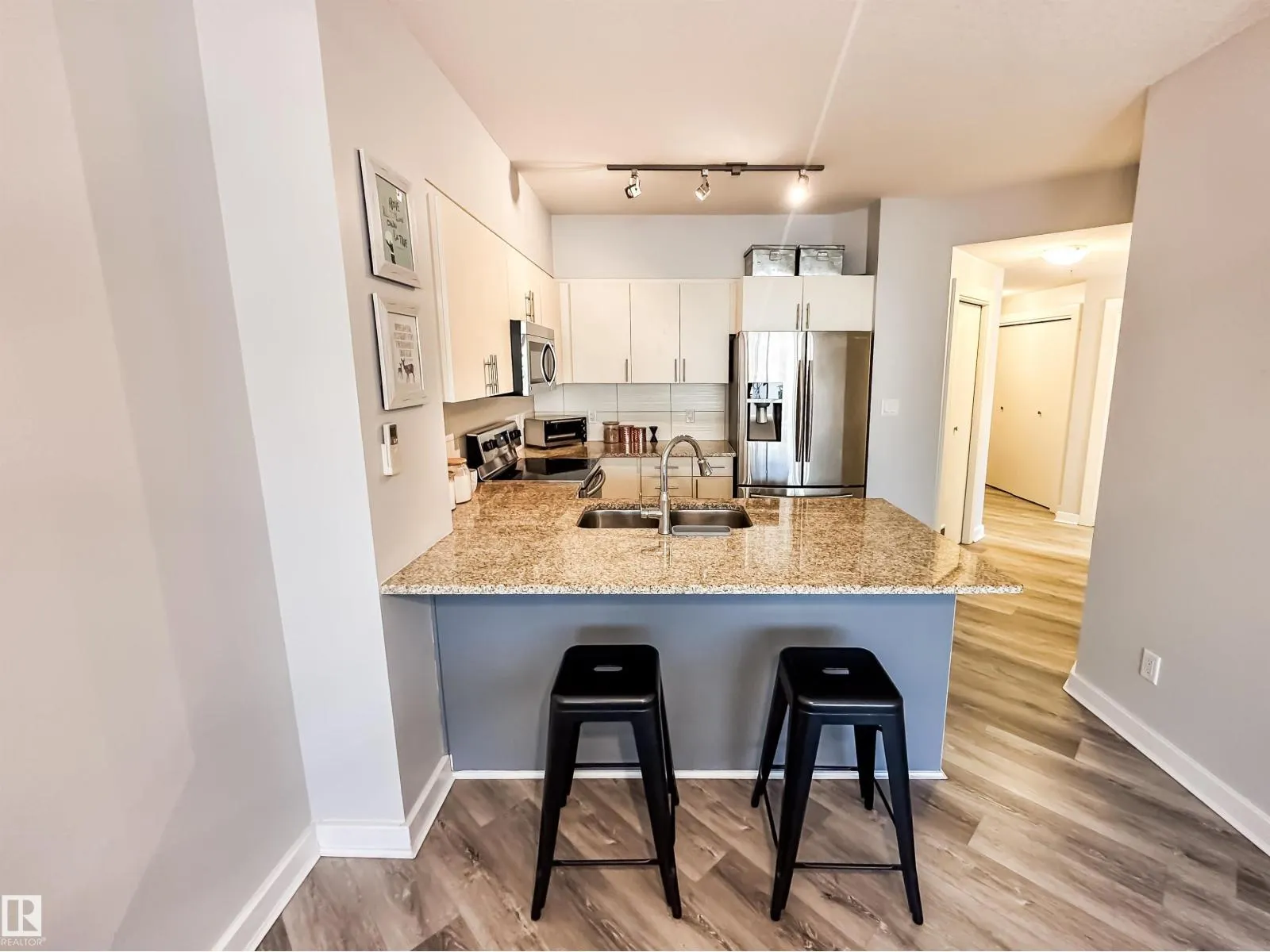 #703 10152 104 ST NW