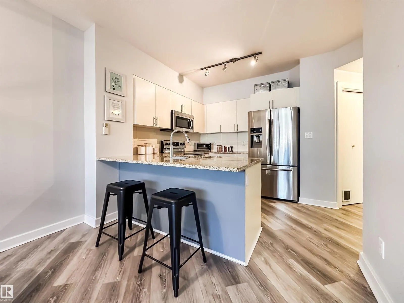 #703 10152 104 ST NW
