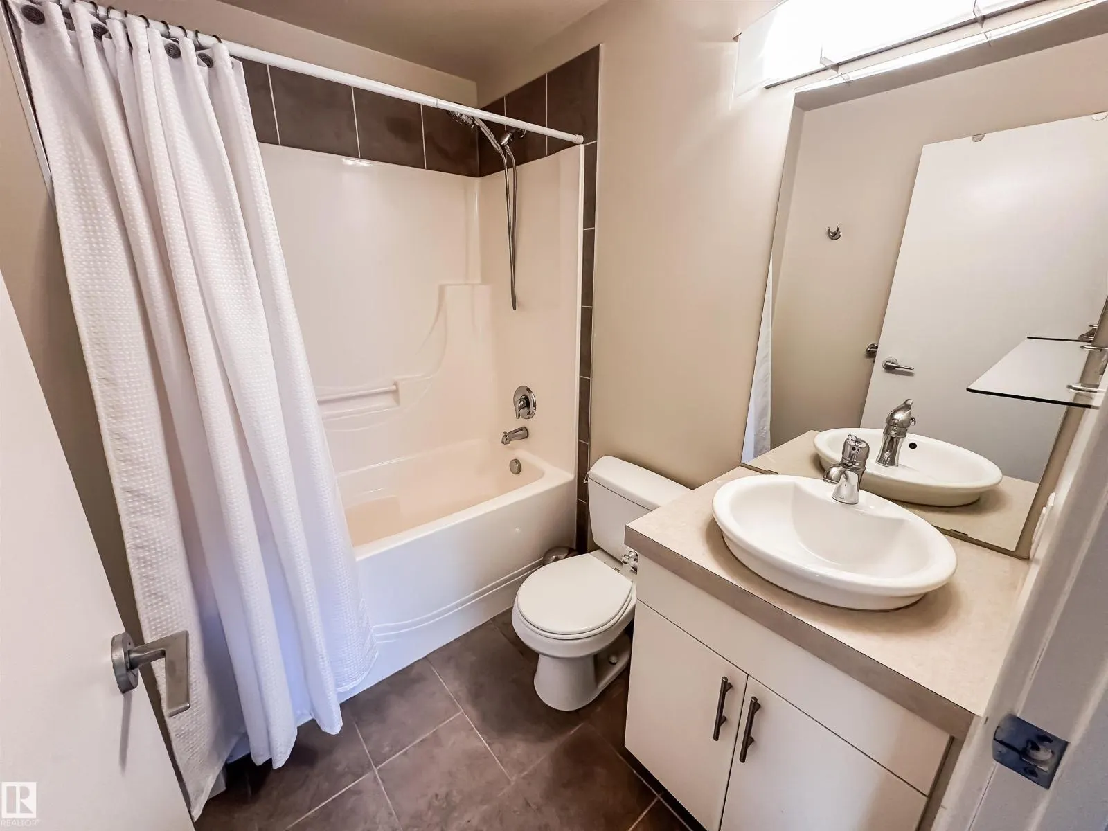 #703 10152 104 ST NW