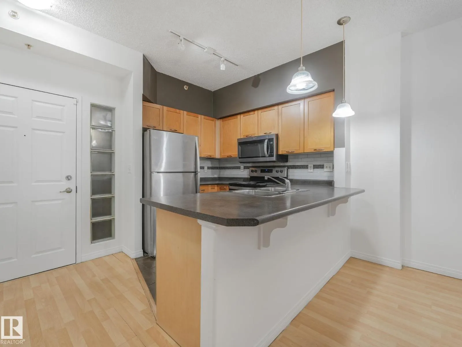 #2-116 4245 139 AV NW