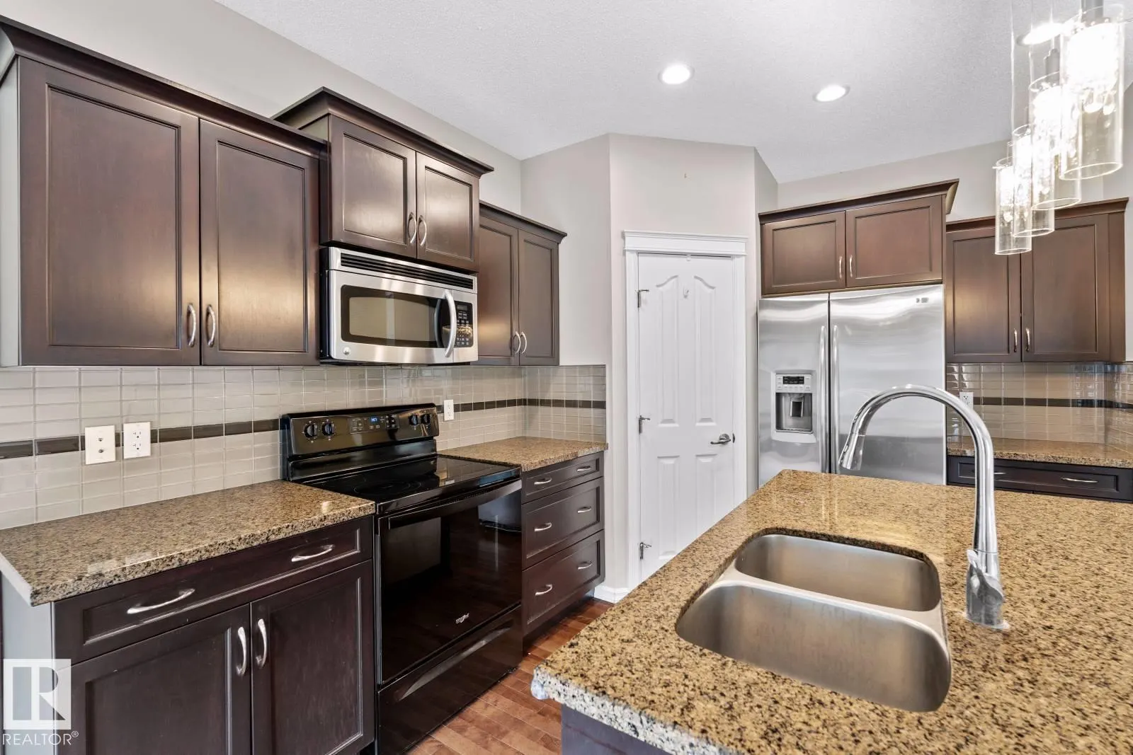 716 ADAMS WY SW