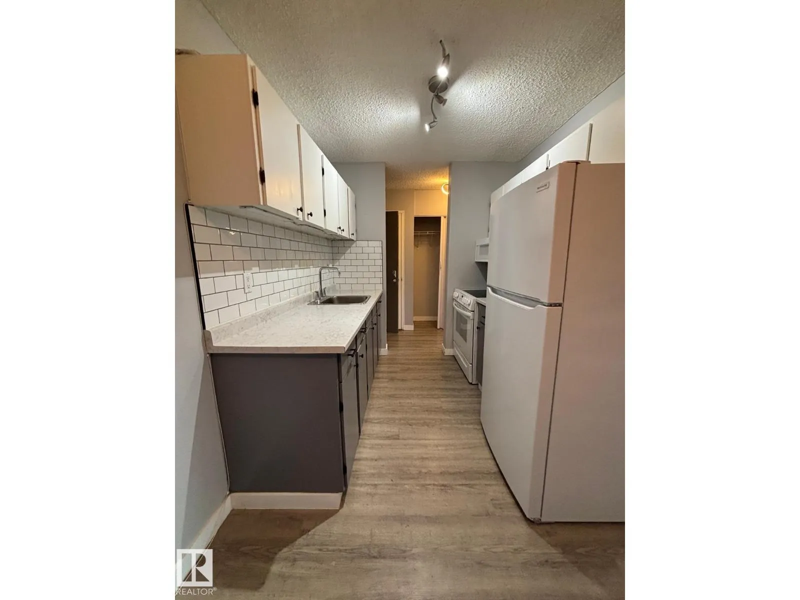 #323 15105 121 ST NW