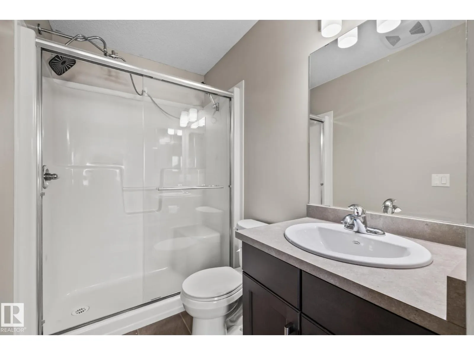 #18 7385 EDGEMONT WY NW