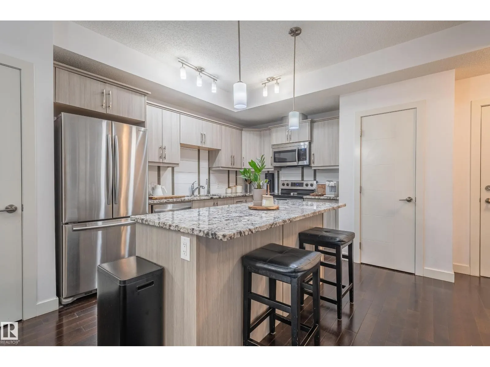 #305 10523 123 ST NW