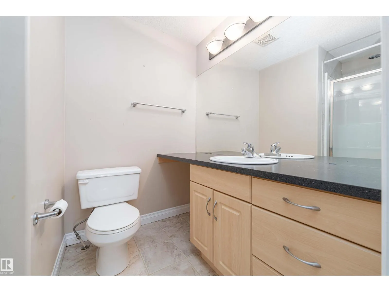 #419 12408 15 AV SW