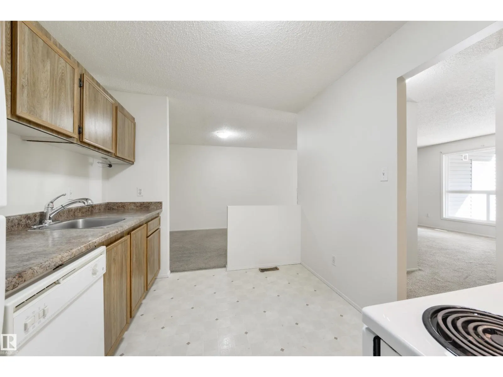 #52 3111 142 AV NW
