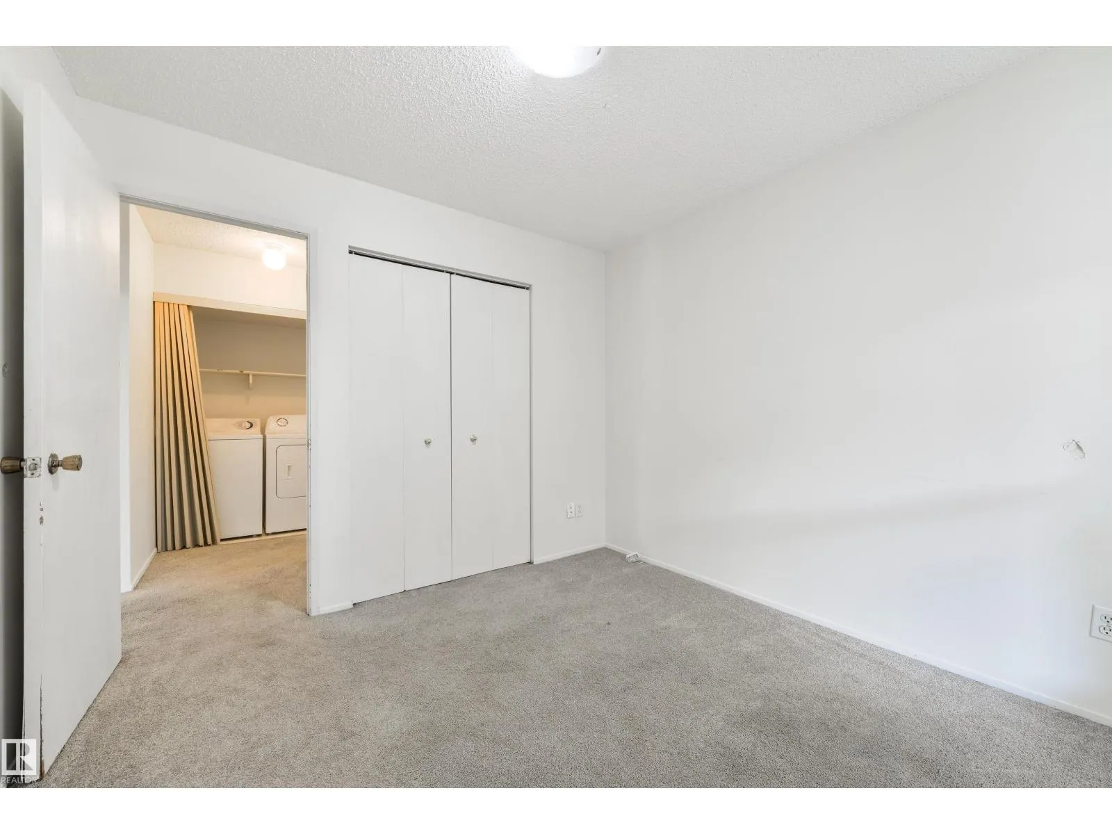 #52 3111 142 AV NW