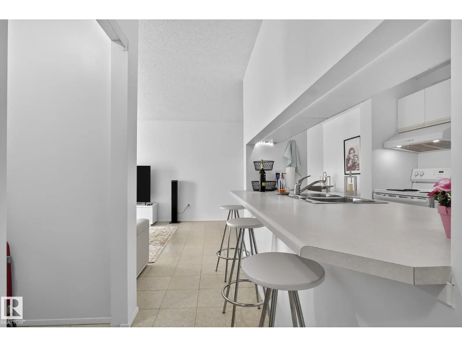 #414 4220 139 AV NW