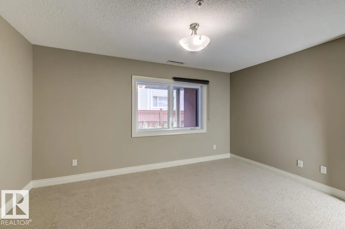 #104 10232 115 ST NW
