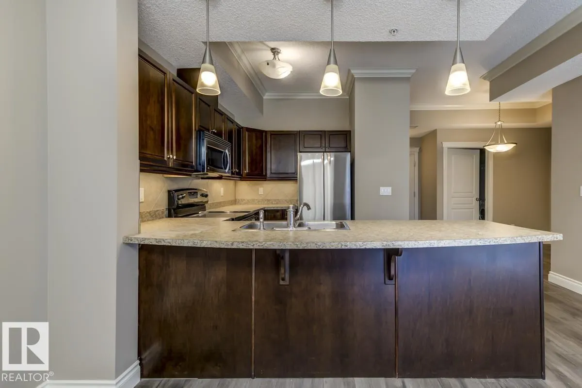 #104 10232 115 ST NW