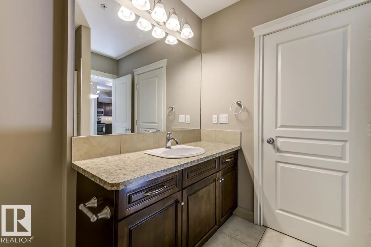 #104 10232 115 ST NW