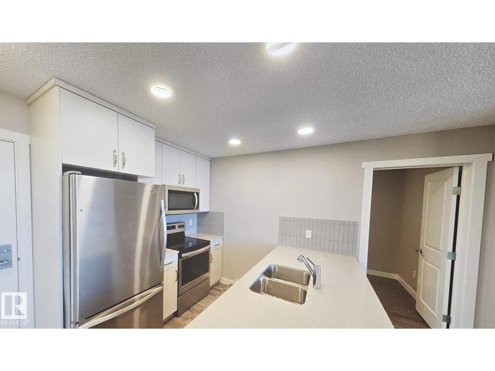 #409 1506 TAMARACK BV NW