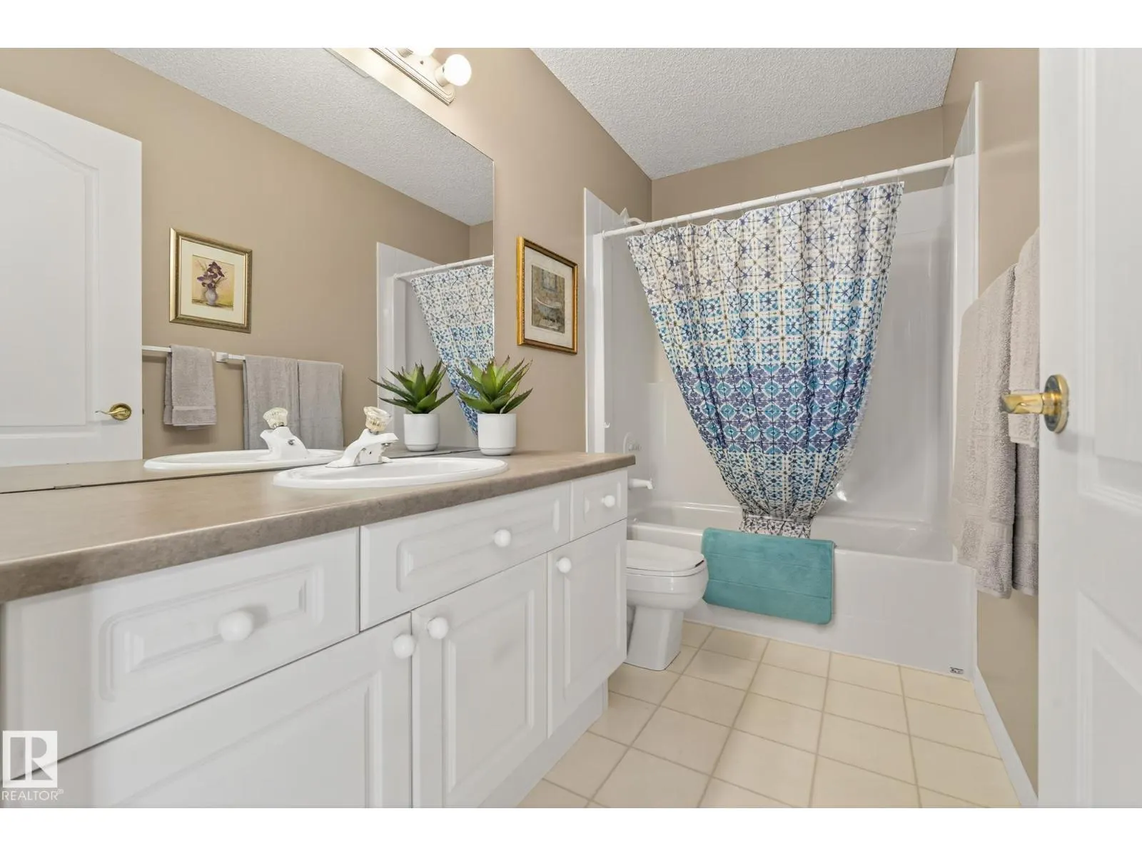 11570 13 AV NW