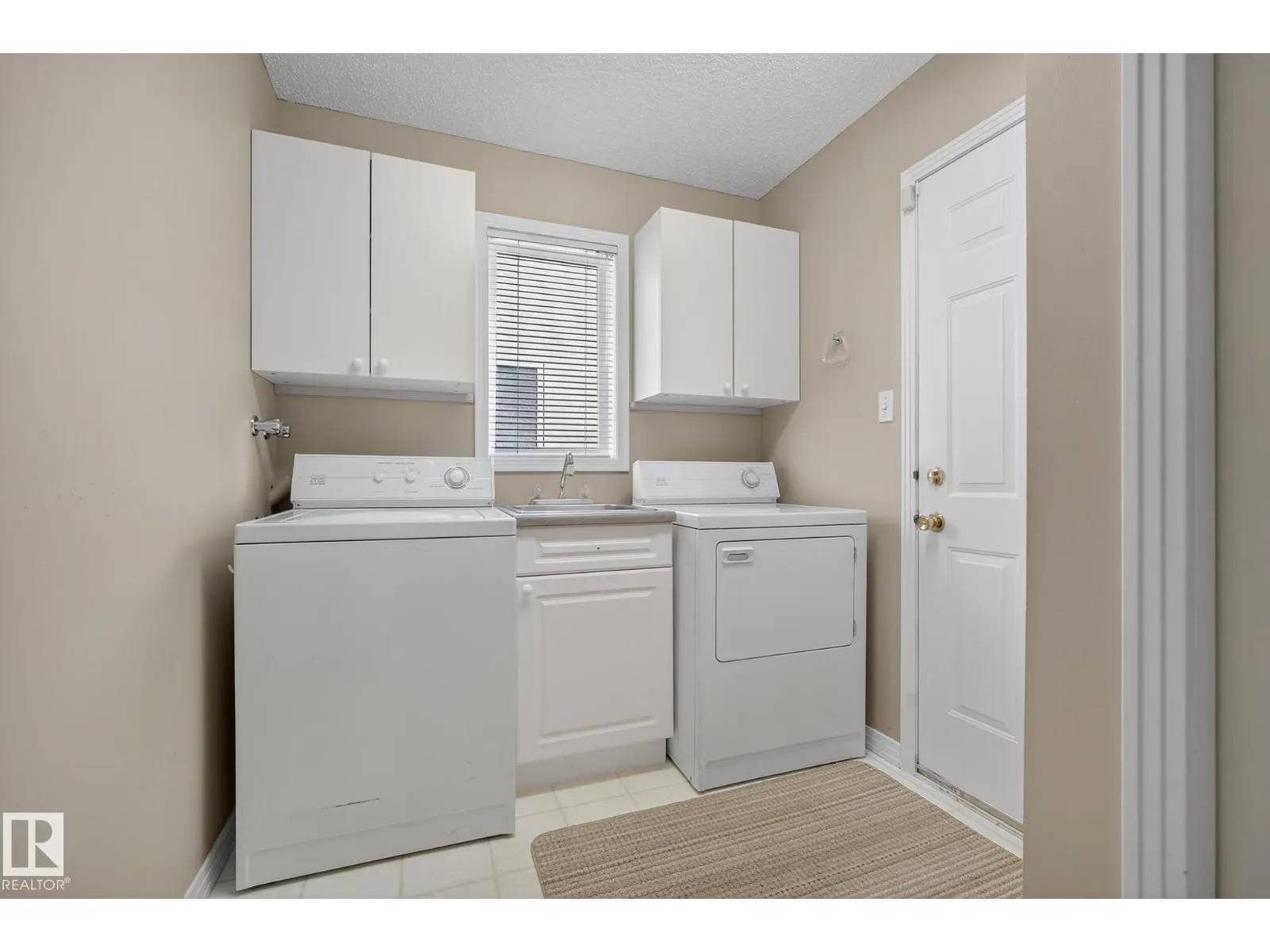11570 13 AV NW