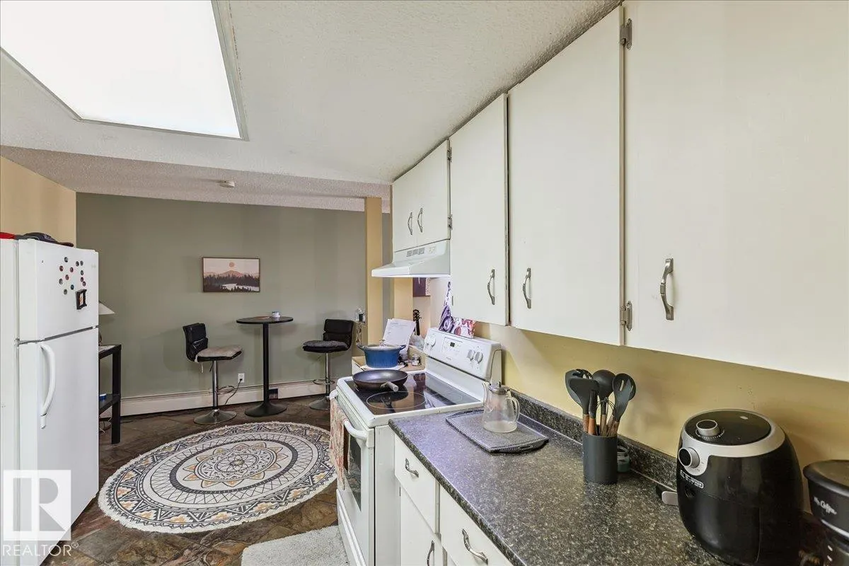 #306 10335 118 ST NW NW