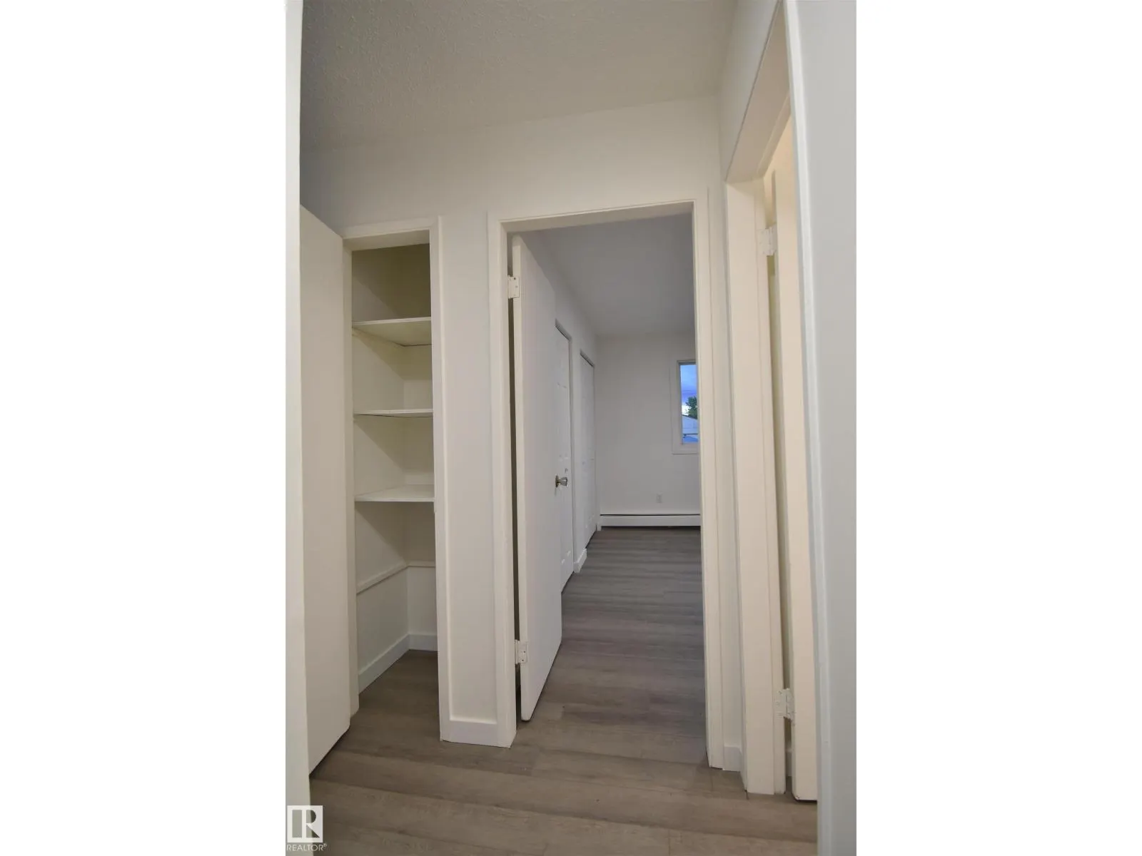 #303 12921 127 ST NW