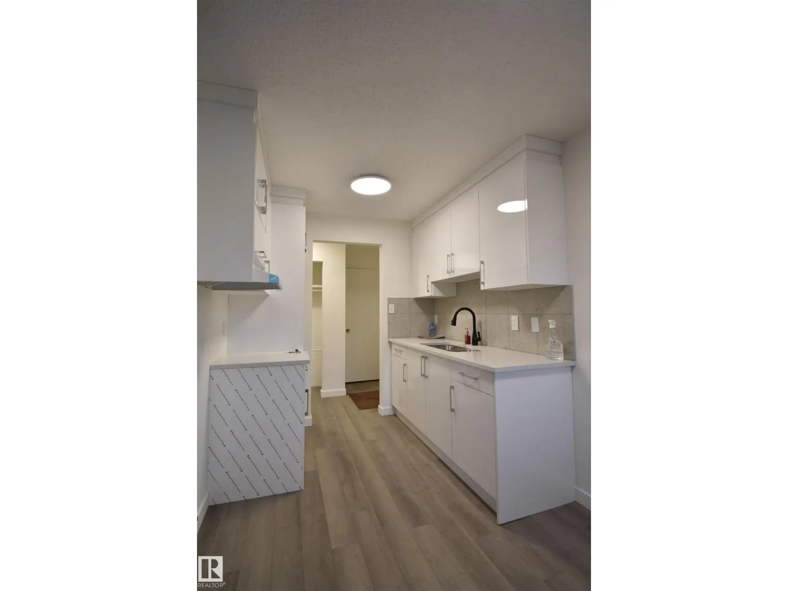 #303 12921 127 ST NW