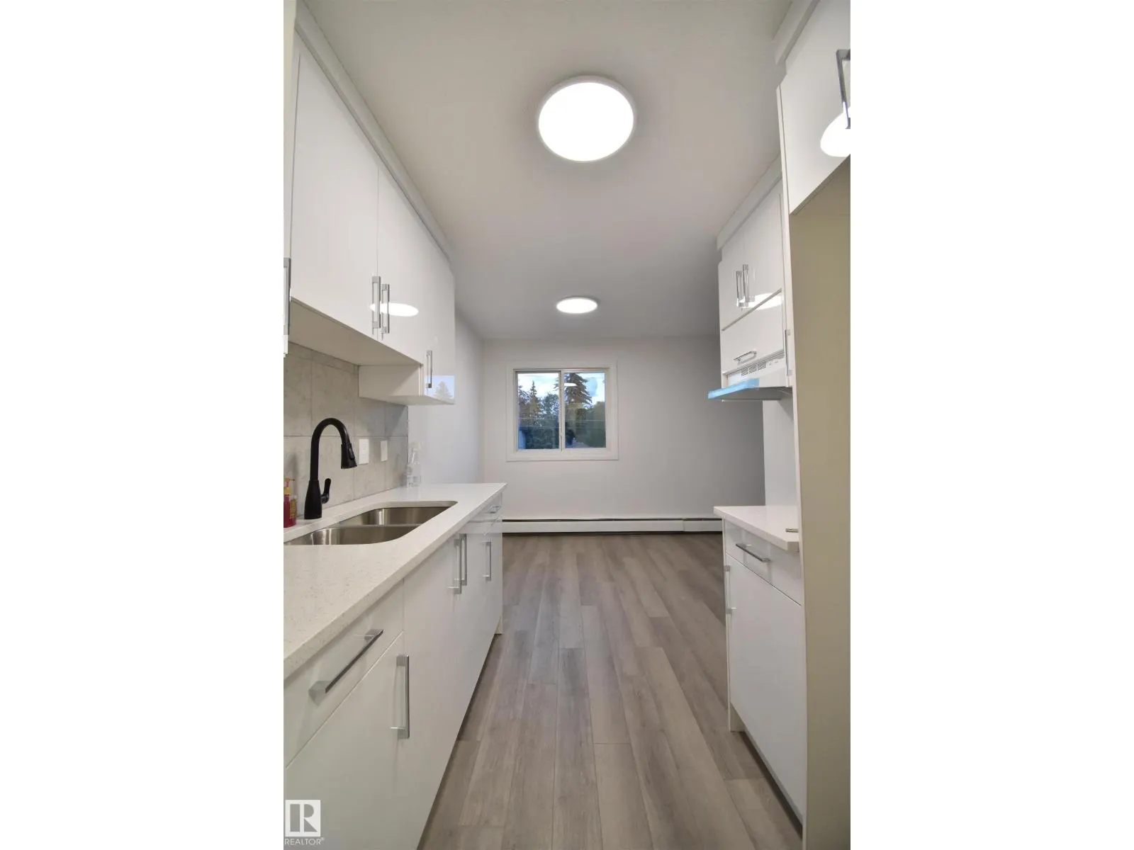 #303 12921 127 ST NW