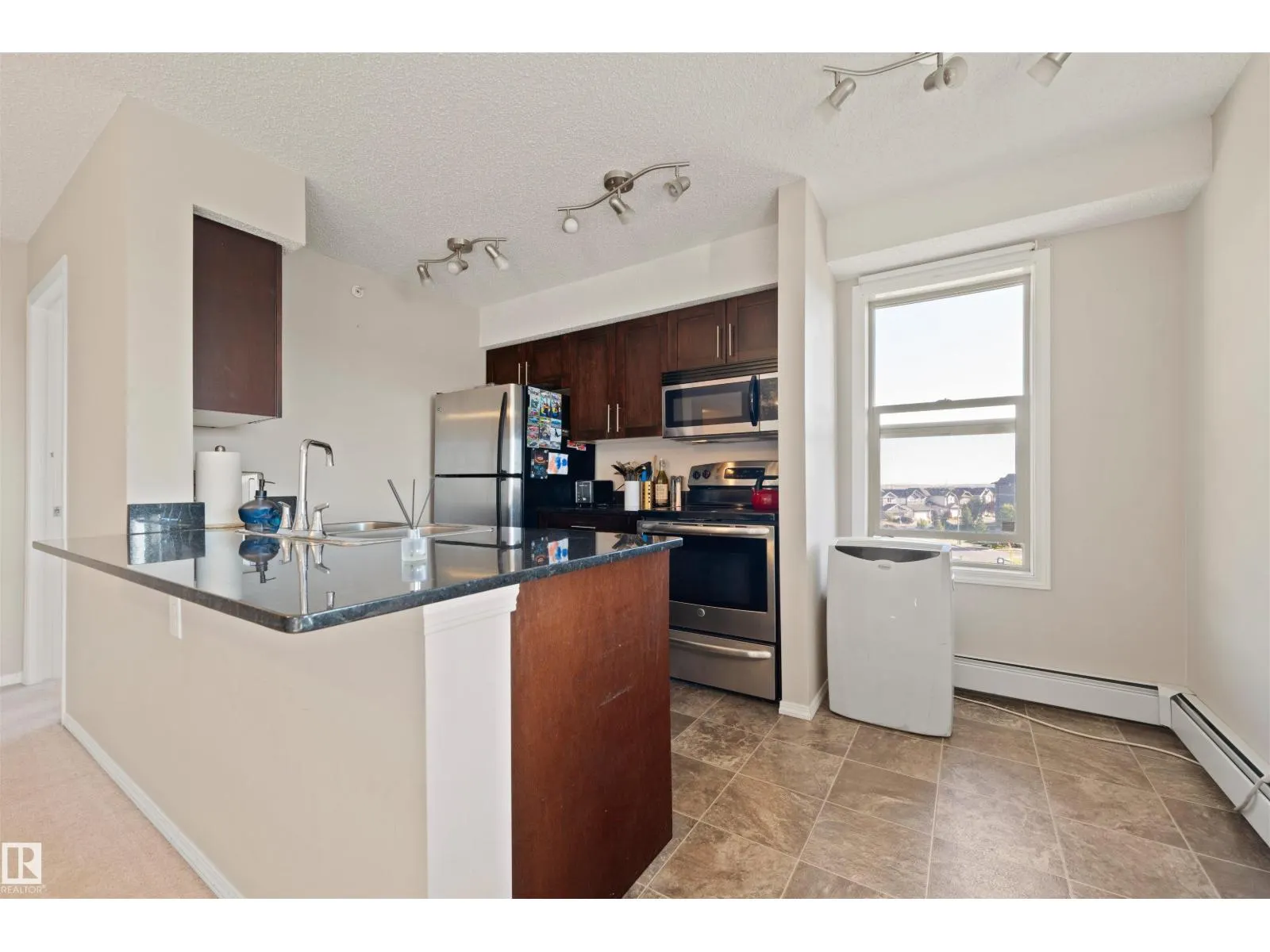 #402 1080 McConachie Blvd NW