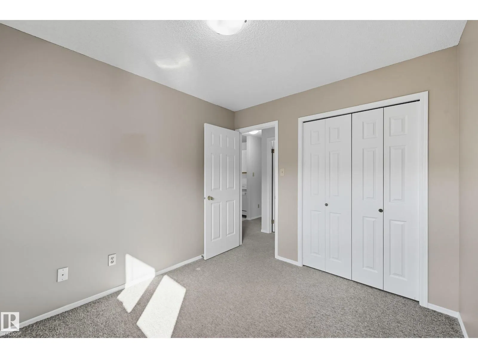 #306 10504 77 AV NW