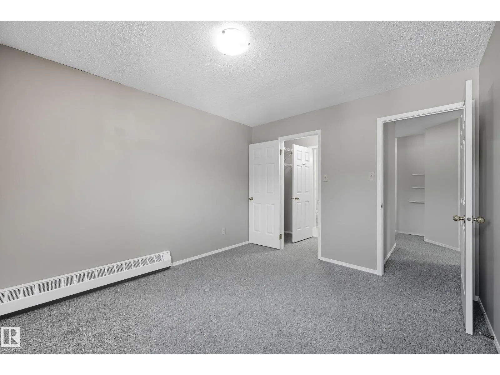 #306 10504 77 AV NW